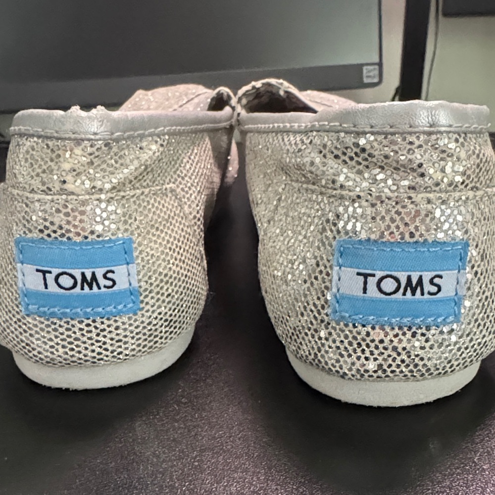 TOMS Shimmering Silver Slip-Ons
